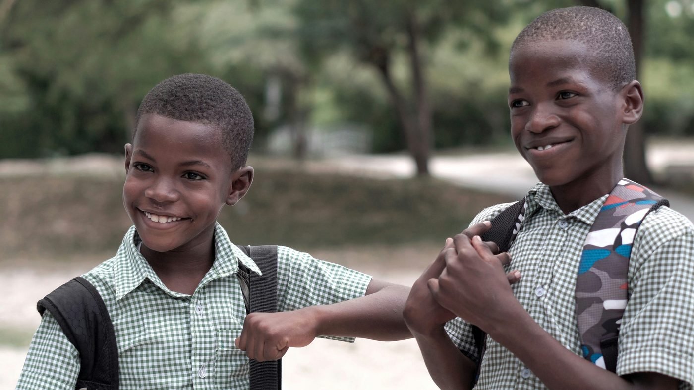 Two schoolmates celebrating together — the community spirit Jumpstreet champions